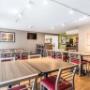 Enjoy breakfast in this seating area Enjoy breakfast in this seating area