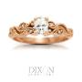 Custom-made rose gold diamond engagement ring with an oval cut center stone and diamond accents. Custom-made rose gold diamond engagement ring with an oval cut center stone and diamond accents.
