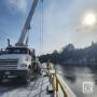 Bridge crane operations over water for remote infrastructure project. Bridge crane operations over water for remote infrastructure project.