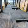 Steel walkway platform installed for safe facility access and maintenance. Steel walkway platform installed for safe facility access and maintenance.