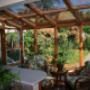 This sunroom adds a sitting area off the kitchen where space was limited This sunroom adds a sitting area off the kitchen where space was limited