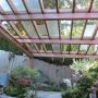 This Pergola covers a backyard Koi pond to protect the fish from Heron's This Pergola covers a backyard Koi pond to protect the fish from Heron's