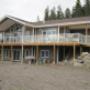 large deck with glass railings large deck with glass railings