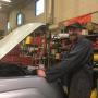 Lake City Auto Repair, Dennis finishing up an oil change Lake City Auto Repair, Dennis finishing up an oil change