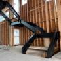 Custom staircase. Wooden steps installed separately Custom staircase. Wooden steps installed separately