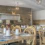 Enjoy breakfast in this seating area Enjoy breakfast in this seating area