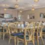 Enjoy breakfast in this seating area Enjoy breakfast in this seating area