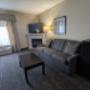 Queen Beds Sofa and Fireplace Queen Beds Sofa and Fireplace