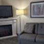 Queen Beds Sofa and Fireplace Queen Beds Sofa and Fireplace
