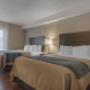 Spacious room with queen beds Spacious room with queen beds