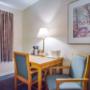 Guest room with table and chairs Guest room with table and chairs
