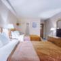 Guest room with double beds Guest room with double beds