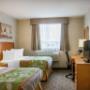 Guest room with double beds Guest room with double beds