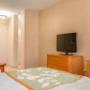 Guest room with flat-screen television Guest room with flat-screen television