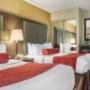 Guest room with double beds Guest room with double beds