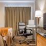 Guest room with flat-screen television Guest room with flat-screen television