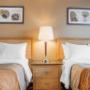 Guest room with double beds Guest room with double beds
