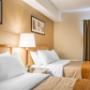 Guest room with double beds Guest room with double beds