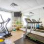 Fitness center with cardio equipment Fitness center with cardio equipment