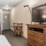 Spacious room with flat-screen television Spacious room with flat-screen television