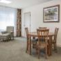Guest room with table and chairs Guest room with table and chairs