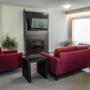 Relax by the fireplace in the lobby Relax by the fireplace in the lobby
