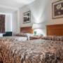 Guest room with double beds Guest room with double beds