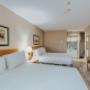 Double Queen Kitchenette with Balcony Double Queen Kitchenette with Balcony