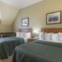 Spacious room with queen beds Spacious room with queen beds