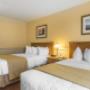 Spacious room with queen beds Spacious room with queen beds