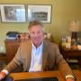 John Tamming, owner and lawyer at Tamming Law, sitting at his desk. John Tamming, owner and lawyer at Tamming Law, sitting at his desk.