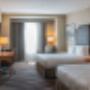 Designed for corporate and leisure traveler alike, make a reservation for our double queen guest room. Designed for corporate and leisure traveler alike, make a reservation for our double queen guest room.
