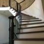 curve-spiral-staircase-iron-spindles-newel-post-oak-grey-treads-white-risers-mississauga-burlington curve-spiral-staircase-iron-spindles-newel-post-oak-grey-treads-white-risers-mississauga-burlington