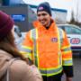 CAA Service Vehicle Operator shaking hands with member CAA Service Vehicle Operator shaking hands with member