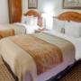 Guest room with double beds Guest room with double beds