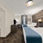 Suite | 1 King & 2 Queen Beds Suite | 1 King & 2 Queen Beds