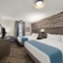Suite | 1 King & 2 Queen Beds Suite | 1 King & 2 Queen Beds
