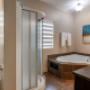 King Suite with Jetted Tub and Game Room King Suite with Jetted Tub and Game Room