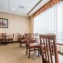 Enjoy breakfast in this seating area Enjoy breakfast in this seating area