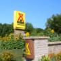 The big yellow sign is hard to miss, but it is extra hard surrounded by the 1000 sunflowers planted each year at the 1000 Islands Ivy Lea KOA campground. The big yellow sign is hard to miss, but it is extra hard surrounded by the 1000 sunflowers planted each year at the 1000 Islands Ivy Lea KOA campground.