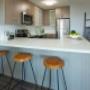Kitchen with breakfast bar at Main Square in Toronto, ON Kitchen with breakfast bar at Main Square in Toronto, ON