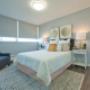 Spacious bedroom with large windows at Main Square in Toronto, ON Spacious bedroom with large windows at Main Square in Toronto, ON