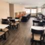 Enjoy breakfast in this seating area Enjoy breakfast in this seating area