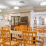 Enjoy breakfast in this seating area Enjoy breakfast in this seating area