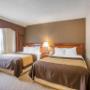 Guest room with double beds Guest room with double beds