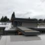 The owner of this custom home opted for a single ply TPO roof system. This non-fossil fuel based product is fully adhered to an overlay board, with the seams heat welded with hot air. Under the overlay is the insulation and vapour retarder. The owner of this custom home opted for a single ply TPO roof system. This non-fossil fuel based product is fully adhered to an overlay board, with the seams heat welded with hot air. Under the overlay is the insulation and vapour retarder.