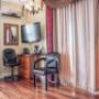 Spacious room with flat-screen television Spacious room with flat-screen television
