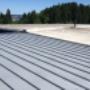 Half of this roof was reroofed using Duro-Last membrane. The Chanels in the metal roof were filled with insulation perimeter framed in to allow for flashing. Half of this roof was reroofed using Duro-Last membrane. The Chanels in the metal roof were filled with insulation perimeter framed in to allow for flashing.