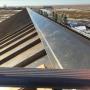 24 gauge standing seam metal roofing system designed to rust. This picture shows the Capping detail what is not visible is the Z bar and screen 24 gauge standing seam metal roofing system designed to rust. This picture shows the Capping detail what is not visible is the Z bar and screen