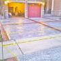 This driveway was divided into sections to avoid putting saw cuts through the stone fan pattern. It was done in two separate pours with Lights installed as well This driveway was divided into sections to avoid putting saw cuts through the stone fan pattern. It was done in two separate pours with Lights installed as well